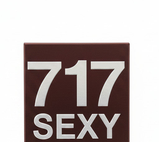 Sexy brown 717 men's eau de parfum bottle with silver accents