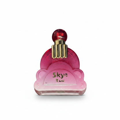 Skye perfume pink gradient bottle with gold detailing and logo text.