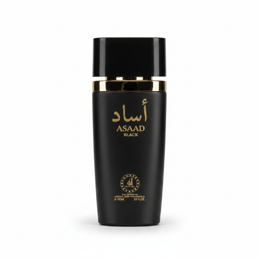 Asaad black eau de parfum bottle gold accents elegant design luxury香水描述中的文字较多涉及抽象概念，因此Alt文本主要聚焦于可视觉化的元素。这里强调的是外观设计和颜色搭配：“Asaad black perfume bottle with gold accents and elegant design”